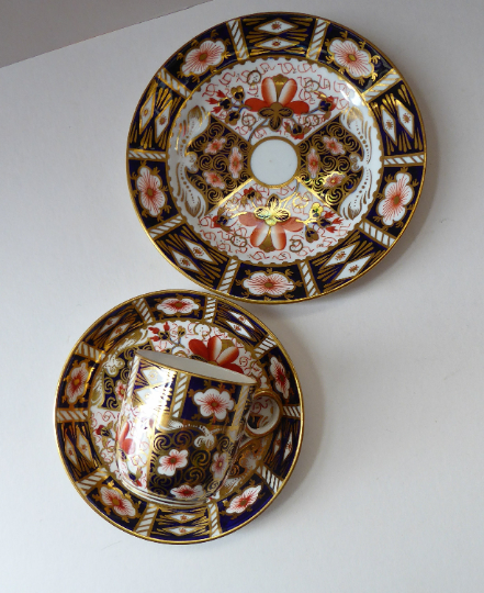 ROYAL CROWN DERBY Imari Pattern 2451. One Trio Consisting of a Cup 