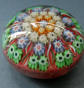  VASART Scottish Glass Paperweight with 9 Spokes; with rose pink ground, latticino canes & millefiori rosette