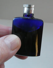 Load image into Gallery viewer, 1930s ART DECO Bourjois &quot;Evening In Paris&quot; Perfume Bottle in Bakelite White Clam Shell Box
