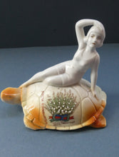 Load image into Gallery viewer, 1920s GERMAN Souvenir. Bathing Belle Riding on the Back of a Turtle. Lucky White Heather Ware Figurine EDINBURGH Location
