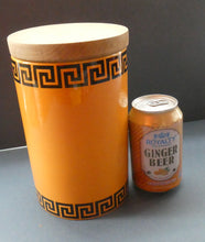 Load image into Gallery viewer, Rarer 1960s Portmeirion Storage Pot  in Tangerine Colour with Dolphin Motif &amp; Original Wooden Lid
