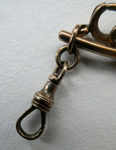 Antique 9CT Gold Double Albert Pocket Watch Chain. Length (clip end to clip end) 16 1/4 inches. Marked 9: 375