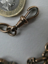 Load image into Gallery viewer, Antique 9CT Gold Double Albert Pocket Watch Chain. Length (clip end to clip end) 16 1/4 inches. Marked 9: 375
