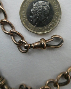 Antique 9CT Gold Double Albert Pocket Watch Chain. Length (clip end to clip end) 16 1/4 inches. Marked 9: 375