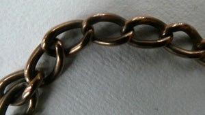 Antique 9CT Gold Double Albert Pocket Watch Chain. Length (clip end to clip end) 16 1/4 inches. Marked 9: 375