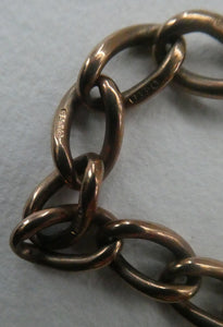 Antique 9CT Gold Double Albert Pocket Watch Chain. Length (clip end to clip end) 16 1/4 inches. Marked 9: 375