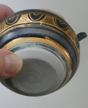 Load image into Gallery viewer, Cornish Studio Pottery. Miniature Gold Lustre PORCELAIN Tea Pot by Mary Rich (1940 - 2022)
