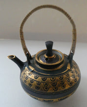 Load image into Gallery viewer, Cornish Studio Pottery. Miniature Gold Lustre PORCELAIN Tea Pot by Mary Rich (1940 - 2022)
