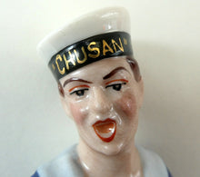 Load image into Gallery viewer, Vintage 1950s GERMAN Dresden Figurine of a Sailor in Uniform Playing a Concertina
