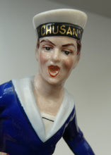 Load image into Gallery viewer, Vintage 1950s GERMAN Dresden Figurine of a Sailor in Uniform Playing a Concertina
