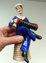 Load image into Gallery viewer, Vintage 1950s GERMAN Dresden Figurine of a Sailor in Uniform Playing a Concertina
