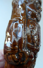 Load image into Gallery viewer, Antique Staffordshire / Scottish 19th Century Bank or Money Box with Treacle Glaze. In the form of a Little Double-Sided Man
