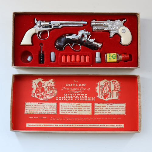 COLLECTOR'S ITEM. Rare Vintage BCM Outlaw Presentation BOX of TOY Miniature Antique Firearms