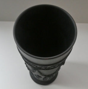 WEDGWOOD Edwardian Black Basalt Spill Vase with Ancanthus Scolls, Garlands, Ram's Head Mask. Height 8 1/2 inches