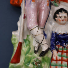 Load image into Gallery viewer, Antique STAFFORDSHIRE Figurine. Rarer Modelled Group: A Huntsman and Little Seated Girl. Excellent Condition. 10 1/4 inches high
