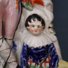 Load image into Gallery viewer, Antique STAFFORDSHIRE Figurine. Rarer Modelled Group: A Huntsman and Little Seated Girl. Excellent Condition. 10 1/4 inches high
