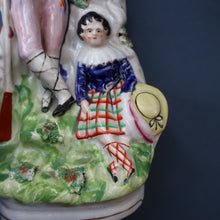 Load image into Gallery viewer, Antique STAFFORDSHIRE Figurine. Rarer Modelled Group: A Huntsman and Little Seated Girl. Excellent Condition. 10 1/4 inches high
