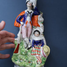 Load image into Gallery viewer, Antique STAFFORDSHIRE Figurine. Rarer Modelled Group: A Huntsman and Little Seated Girl. Excellent Condition. 10 1/4 inches high
