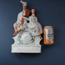 Load image into Gallery viewer, ANTIQUE Victorian Staffordshire Flatback Figurine. A Highlander and his Sweetheart Sitting on a Clock Face. Poor Man&#39;s Clock
