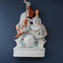 Load image into Gallery viewer, ANTIQUE Victorian Staffordshire Flatback Figurine. A Highlander and his Sweetheart Sitting on a Clock Face. Poor Man&#39;s Clock
