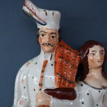 Load image into Gallery viewer, ANTIQUE Victorian Staffordshire Flatback Figurine. A Highlander and his Sweetheart Sitting on a Clock Face. Poor Man&#39;s Clock
