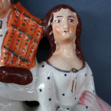 Load image into Gallery viewer, ANTIQUE Victorian Staffordshire Flatback Figurine. A Highlander and his Sweetheart Sitting on a Clock Face. Poor Man&#39;s Clock
