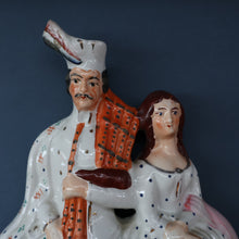 Load image into Gallery viewer, ANTIQUE Victorian Staffordshire Flatback Figurine. A Highlander and his Sweetheart Sitting on a Clock Face. Poor Man&#39;s Clock
