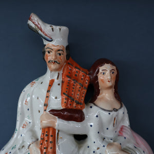 ANTIQUE Victorian Staffordshire Flatback Figurine. A Highlander and his Sweetheart Sitting on a Clock Face. Poor Man's Clock