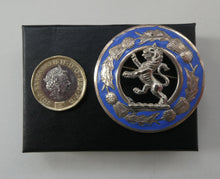 Load image into Gallery viewer, Vintage White Metal Celtic Style Brooch with Lion Rampant Motif, Thistle Motifs and Blue Enamel
