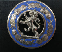 Load image into Gallery viewer, Vintage White Metal Celtic Style Brooch with Lion Rampant Motif, Thistle Motifs and Blue Enamel
