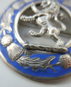 Vintage White Metal Celtic Style Brooch with Lion Rampant Motif, Thistle Motifs and Blue Enamel