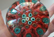 Load image into Gallery viewer, Beautiful 1950s VASART Paperweight with 9 Twisted Spokes; with a red ground
