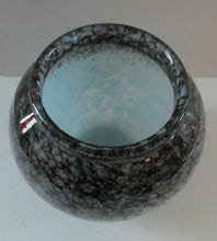 Load image into Gallery viewer, SCOTTISH GLASS. MONART Scottish Art Glass Vase. Bulbous Shape (A). Mottled Lilac Grey-Blue with Black Flecks &amp; Gold Aventurine at the Rim. 5 inches high
