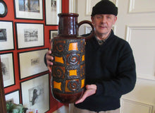 Load image into Gallery viewer, MASSIVE West German 1970s Floor Vase with Brown &amp; Orange Glazes. Applied Fat Lava Abstract Shapes
