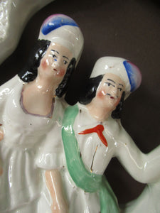 Antique Staffordshire Flatback Figurine. Courting Couple Sitting Under a Bough