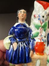 Load image into Gallery viewer, Antique Staffordshire Miniature Spill Vase. A Courting Couple Standing at a Well over a Stream
