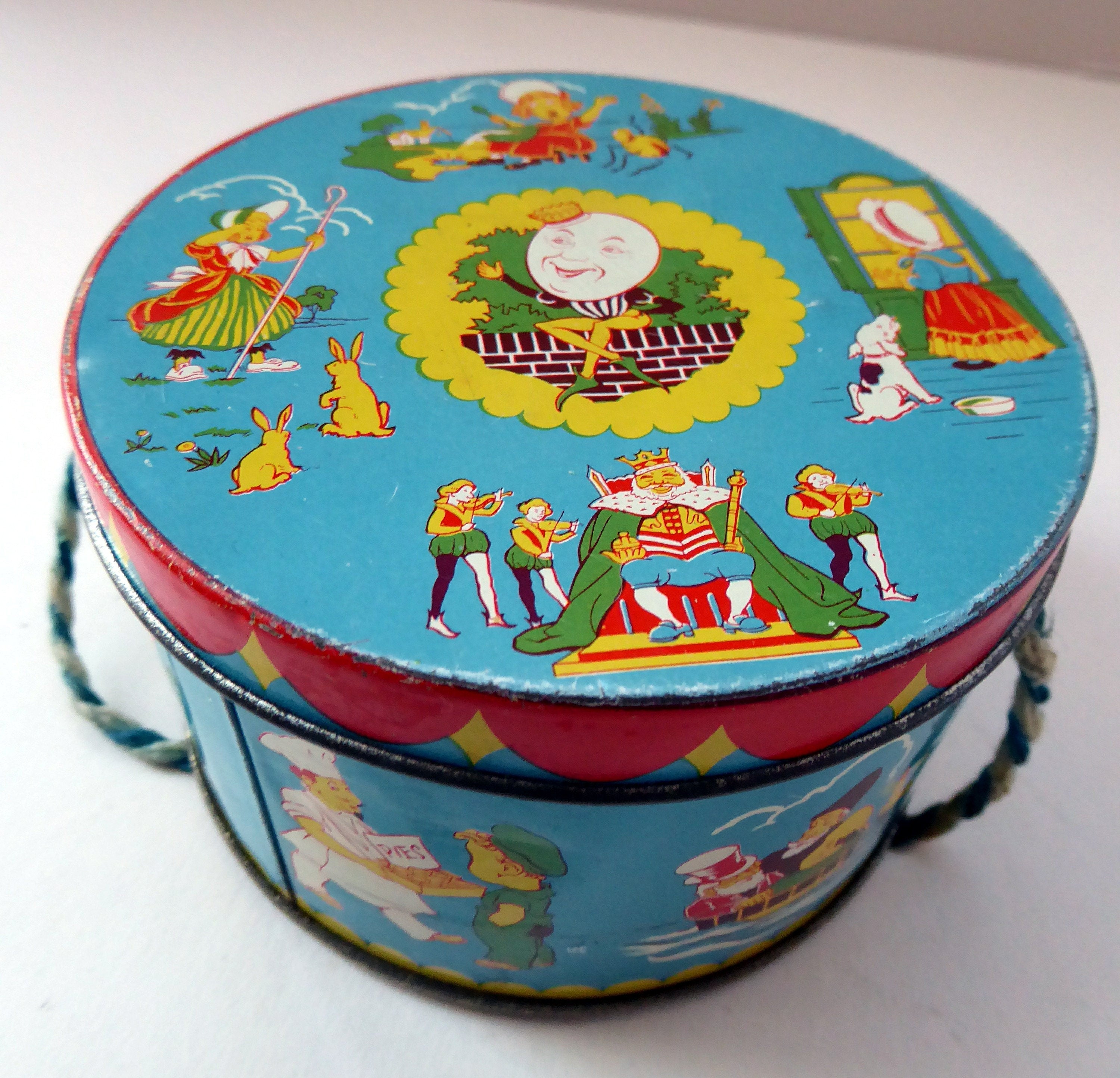 Four Metal hot Flowered Tins; Larger Handled Tin from 1950s, Medium Wang and Bunte Round Tins from 1970s, and Wee Marigold Soap Tin from 1980s