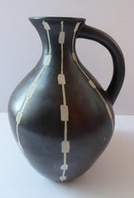 Load image into Gallery viewer, Unusual Black and White Pitcher or Jug. Matt Black Glaze with Incised Abstract Pattern. Signed SILA on the base
