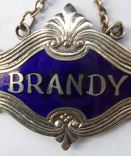 Load image into Gallery viewer, 1930s SILVER PLATE and Royal Blue Guilloche Enamel Brandy Decanter Label
