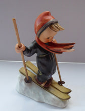 Load image into Gallery viewer, Collectable 1960s Issue. HUMMEL Figurine. The Skier with Original Wooden Skis
